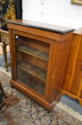 An Edwardian inlaid walnut pier cabinet.