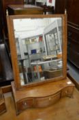 A George III mahogany dressing table mirror with rectangular mirror plate and three drawers to the