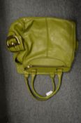 A Jaeger green leather handbag.
