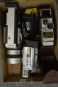 A Bell & Howell 624EE Autoset cine camera and other video cameras.