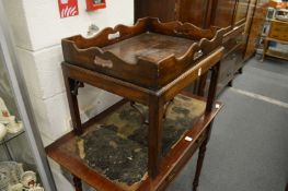 An oak butlers tray on stand.