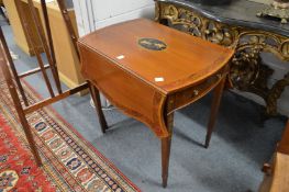 A pair of Sheraton Revival satinwood Pembroke tables.