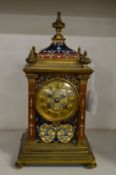 A French ormolu and champleve enamel mantel clock.