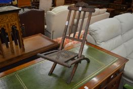 A miniature folding chair.