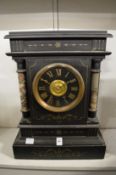 A large Victorian slate mantel clock, the dial signed Hobday.