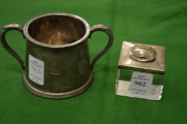 A silver mounted inkwell and a GWR plated sugar bowl.
