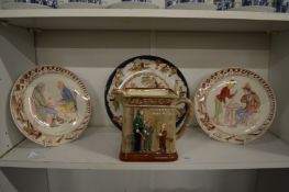A pair of amusing French pottery plates, Doulton pottery jug 'Oliver Asks For More' and a
