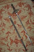 An early 19th century sword and scabbard, possibly made for theatrical use.