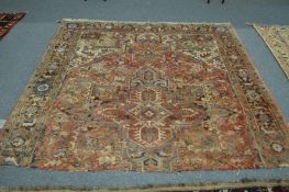 A Persian carpet, cream ground with stylised decoration (reduced in length) 205cm x 220cm.