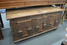 A large Continental oak coffer.