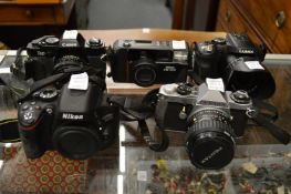Collection of cameras to include Canon T60, Pentax ME Super etc.