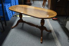 A mahogany coffee table.