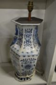 A Chinese blue and white lamp vase.