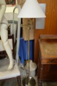 An adjustable floor standing lamp.