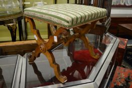 A 19th century walnut X framed stool.