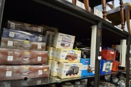 A large quantity of boxed model buses etc.