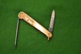 A 9ct gold pen knife.