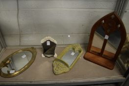 Four decorative small mirrors.