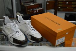 Louis Vuitton, a pair of Christian Lady trainers, size 43, appear unworn in original box.