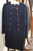 Chanel, a ladies navy blue classic dress with red trim and Chanel gilt buttons, approximate size