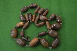 Rhino horn bead necklace.