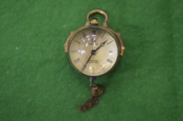 A pendant ball shaped watch.