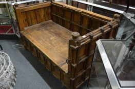 A large Indonesian metal bound teak settee.