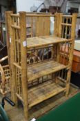 A folding bamboo shelving unit.