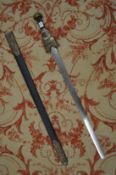 An early 19th century sword and scabbard, possibly made for theatrical use.