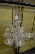 A Venetian glass six branch chandelier.