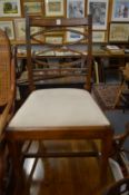 A pair of 19th century mahogany dining chairs.