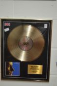 Phil Collins, Hello I Must Be Going, a limited edition gold disc no 5 of 50, framed glazed.