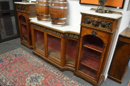 A good Victorian burr walnut and marble sectional side cabinet with ormolu mounts.