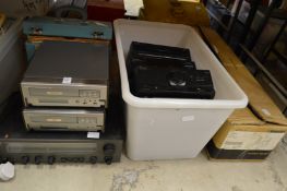 A NAD amplifier together with other hi-fi equipment and accessories.