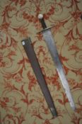 An early 19th century sword and scabbard, possibly made for theatrical use.