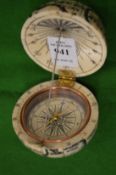 A bone pocket globe/compass.