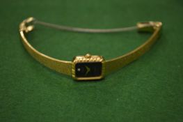 A ladies Accurist wrist watch.