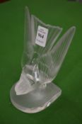 A Lalique frosted glass bird book end or ornament.
