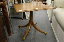 A mahogany occasional table.