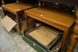 A pair of teak coffee tables.
