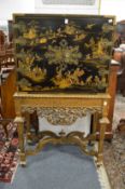 A good chinoiserie decorated cabinet of gilt wood stand with ornate brass strap work.