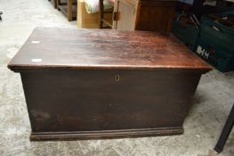 A stained pine trunk.