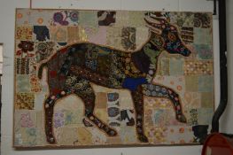 A large woven psychedelic abstract figure of a deer.