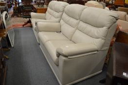 A good pair of G plan light grey leather upholstered two seater settee's.