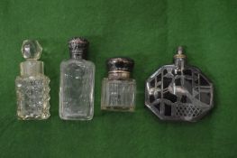 Silver topped scent bottles.