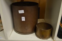 Two large brass shell cases (cut down).