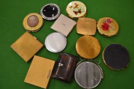 A collection of ladies compacts.