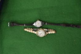 A ladies 9ct gold cased wrist watch with original case.