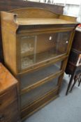 A Lebus four section oak bookcase.