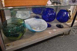 A large art glass bowl signed Siddy Langley 2002, together with another stylish glass bowl and a
